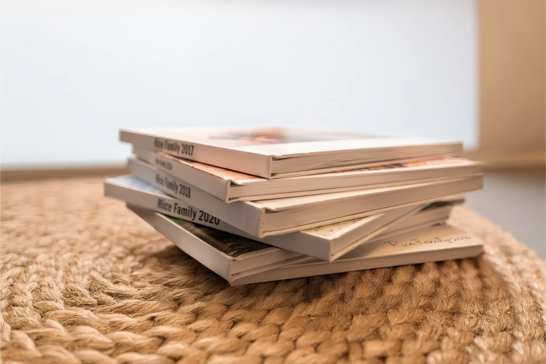 Collection of beautifully printed custom photo books casually arranged